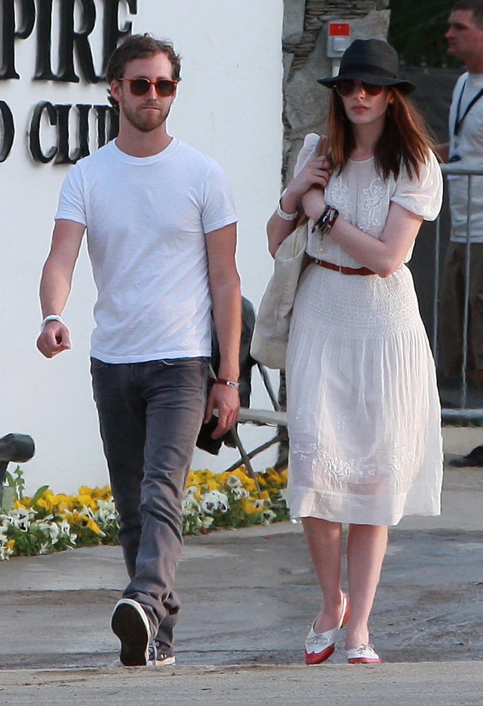Anne Hathaway and Adam Shulman coupled up for Coachella in 2010.