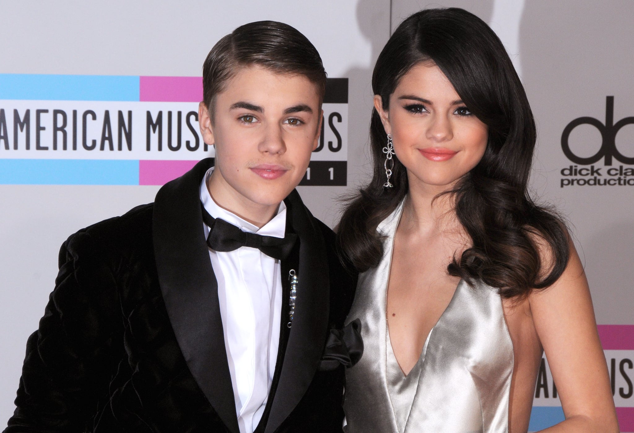 LOS ANGELES, CA - NOVEMBER 20:  Singer Justin Bieber and singer/actress Selena Gomez arrive at the 2011 American Music Awards held at Nokia Theatre L.A. Live on November 20, 2011 in Los Angeles, California.  (Photo by Barry King/FilmMagic)