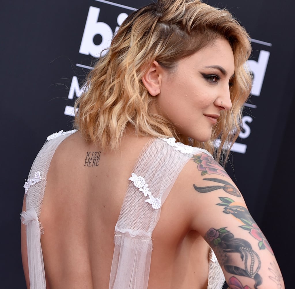 Julia Michaels's "Kiss Here" Back Tattoo