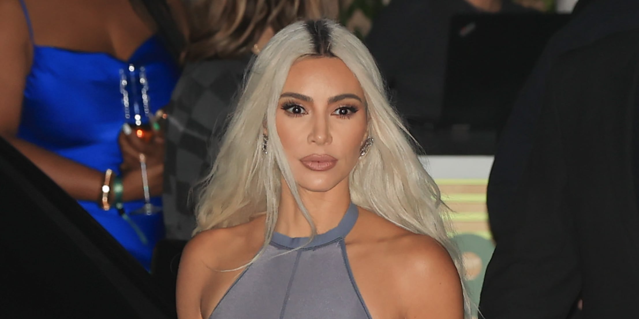 Kim Kardashian Sparkles With Balenciaga Bag and Catsuit at 818