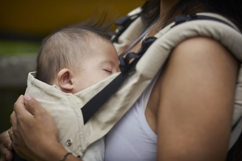 Don't Want to Pass the Baby Around? Wear a Carrier