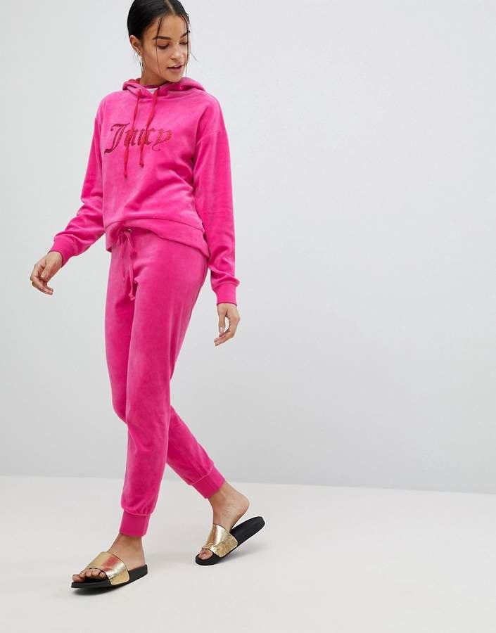 juicy couture tracksuits with juicy on the bottom