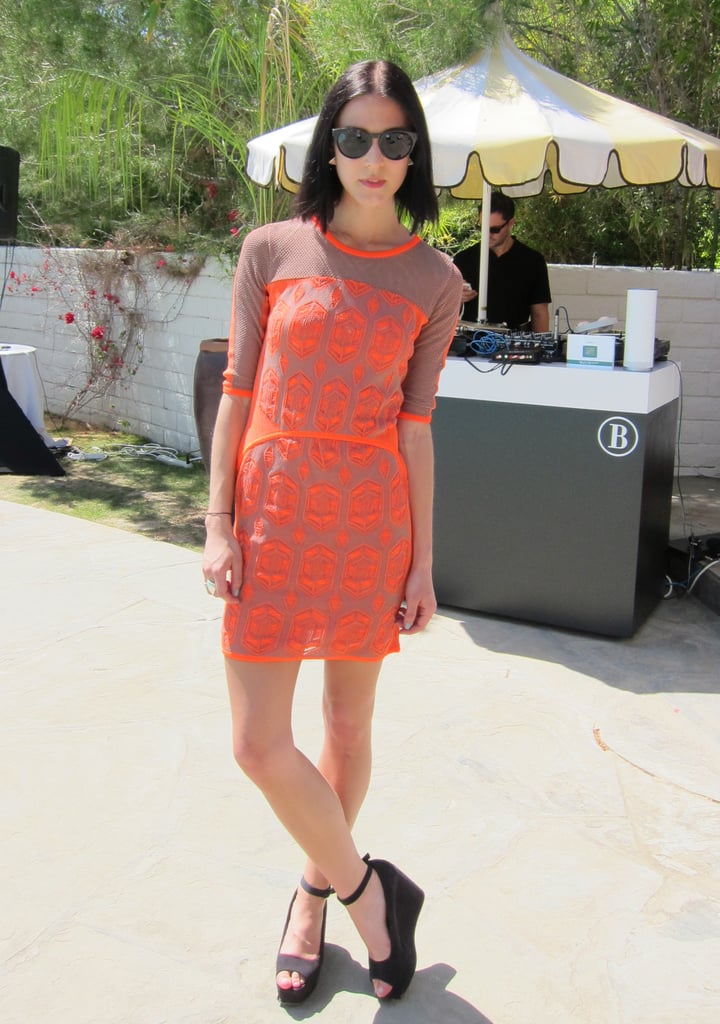 Rosanna Munter of K.I.D.S showed off her Coachella party style in an orange body-con dress and wedge sandals.
Source: Chi Diem Chau