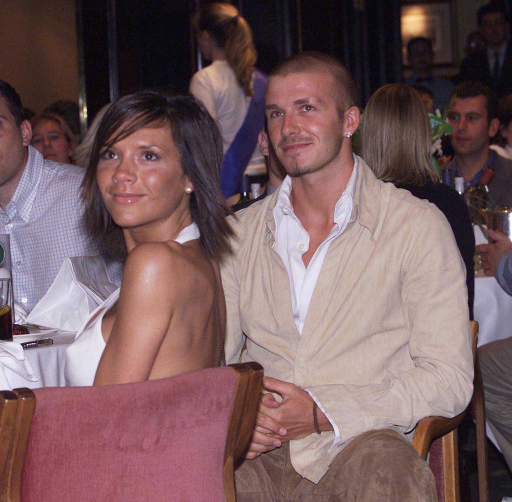 They stuck together at a London event in June 2001. | David and ...