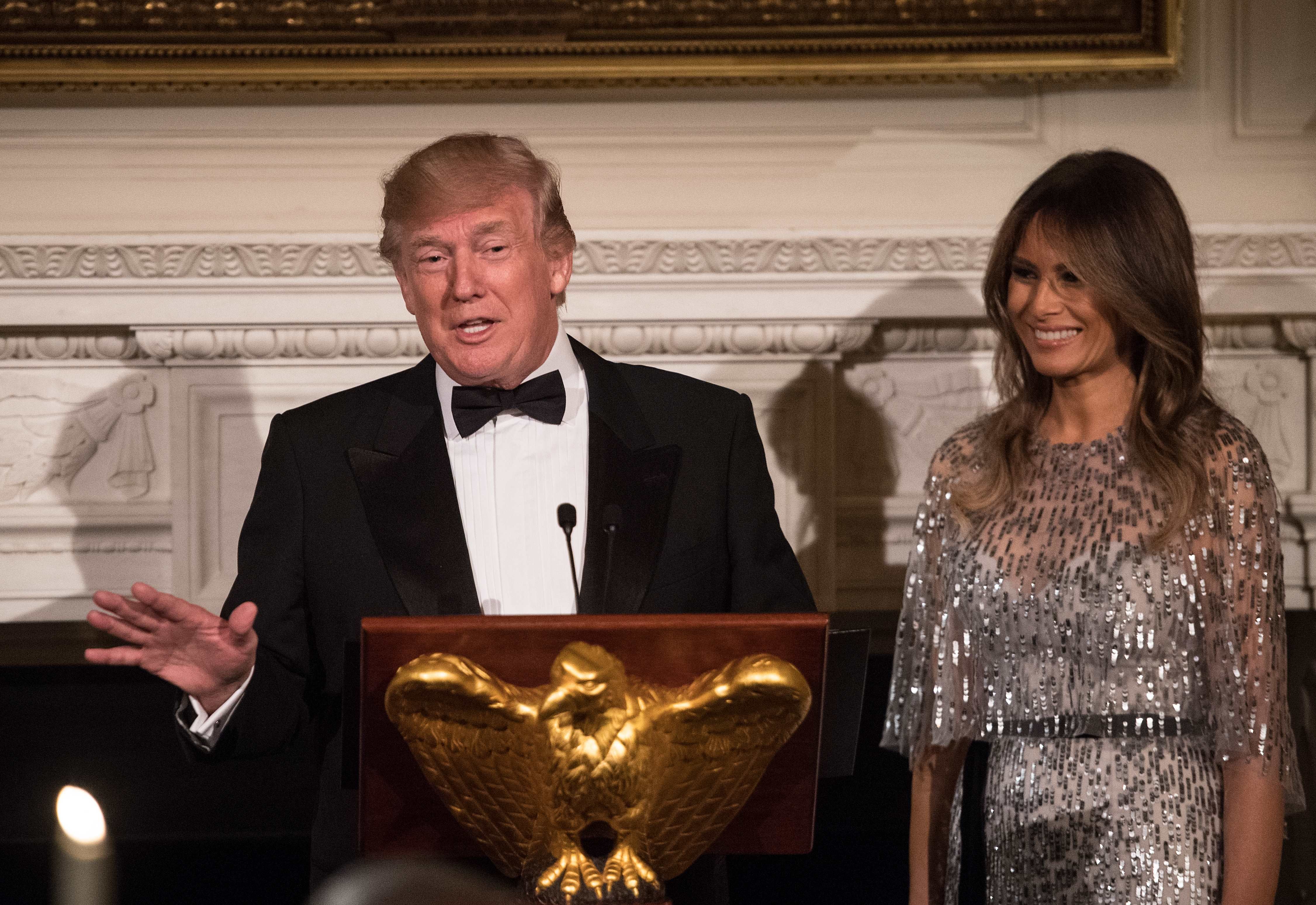 melania silver dress Melania Trump's Silver Gown Steals Mar-a-Lago New Year's Eve