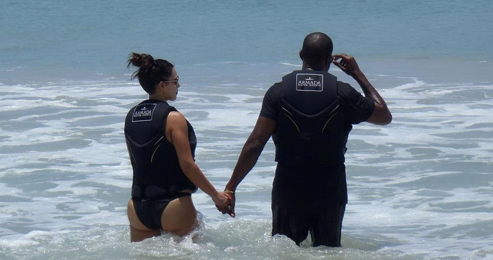 Kim and Kanye waded into the water. 
Source: Casa Aramara