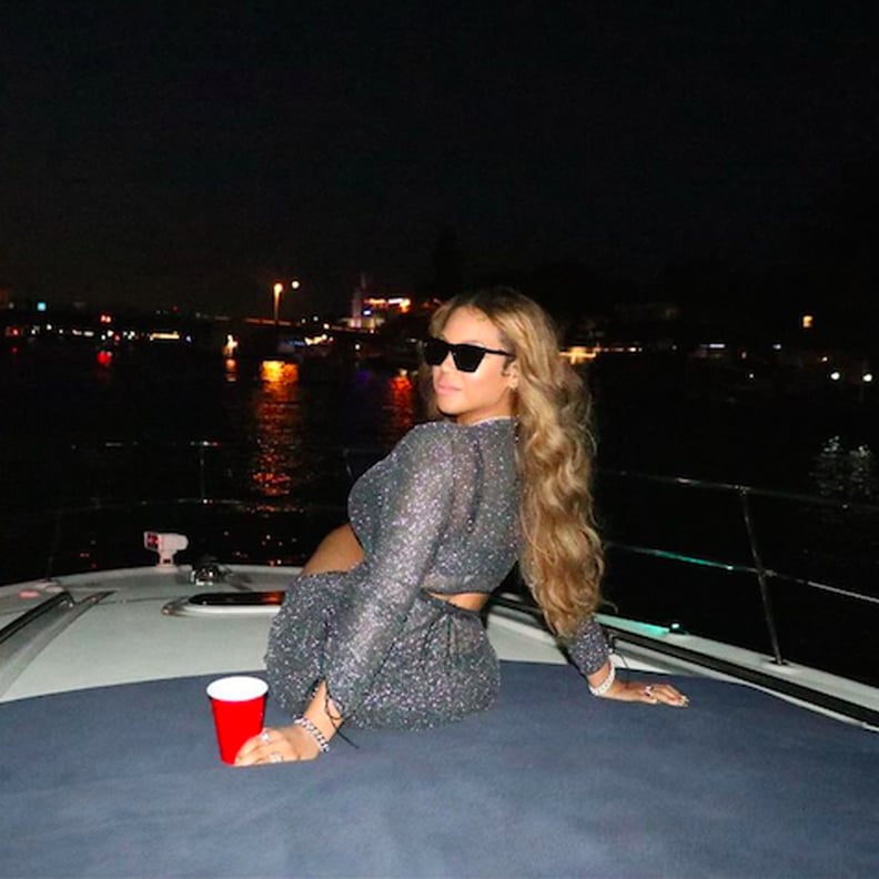 Beyoncé Wears a Metallic Oséree Outfit on a Boat | POPSUGAR Fashion