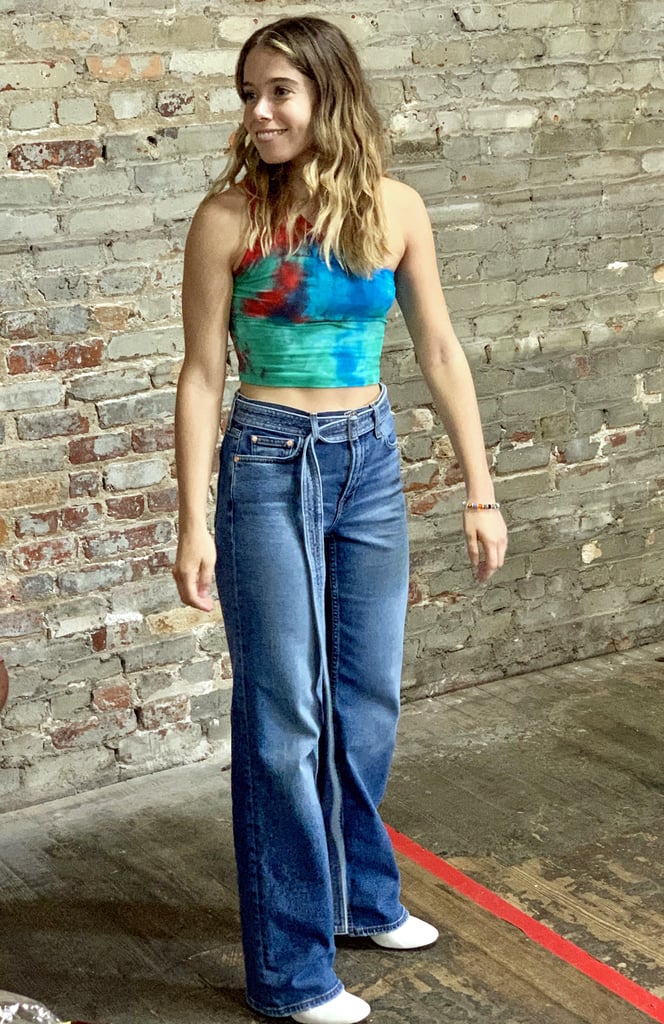 I did mix in some groovy tie-dye here, with the help of this Cotton Citizen crop top, but my wide-leg jeans blended both decades perfectly. The silhouette was a salute to the '70s, while the long belt and boot-cut length were details Britney Spears would've favored in the '90s.
