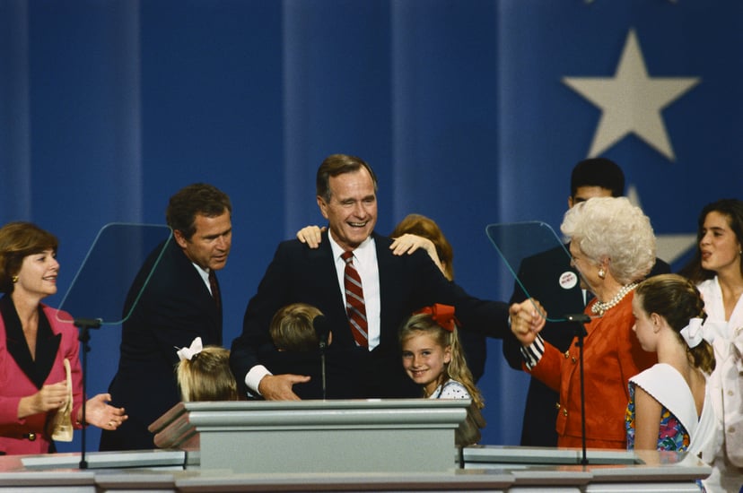George Bush on the podium at the 1992 Republican National Convention. He is joined by (left to right) daugther-in-law Laura Bush, her husband George W., and her daughter Jenna, an unidentified grandson hugging the President, granddaughter Barbara, wife Ba