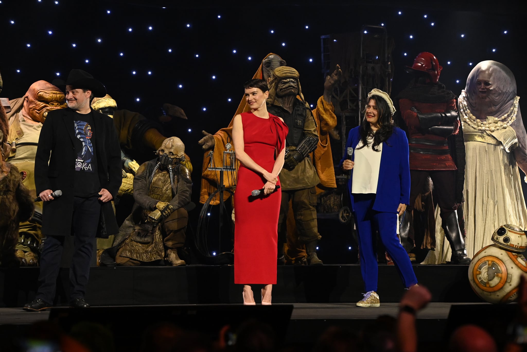 LONDON, ENGLAND - APRIL 07: Dave Filoni, Daisy Ridley and Sharmeen Obaid-Chinoy onstage during the studio panel at the Star Wars Celebration 2023 in London at ExCel on April 07, 2023 in London, England. (Photo by Kate Green/Getty Images for Disney)