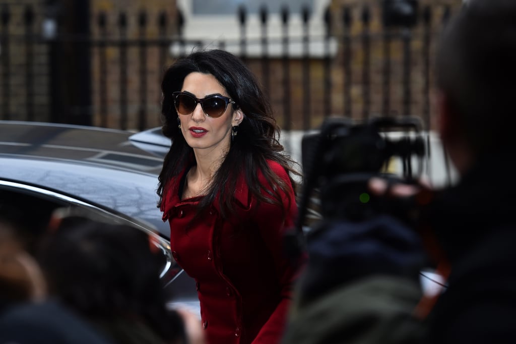 Amal Clooney Wearing a Red Suit