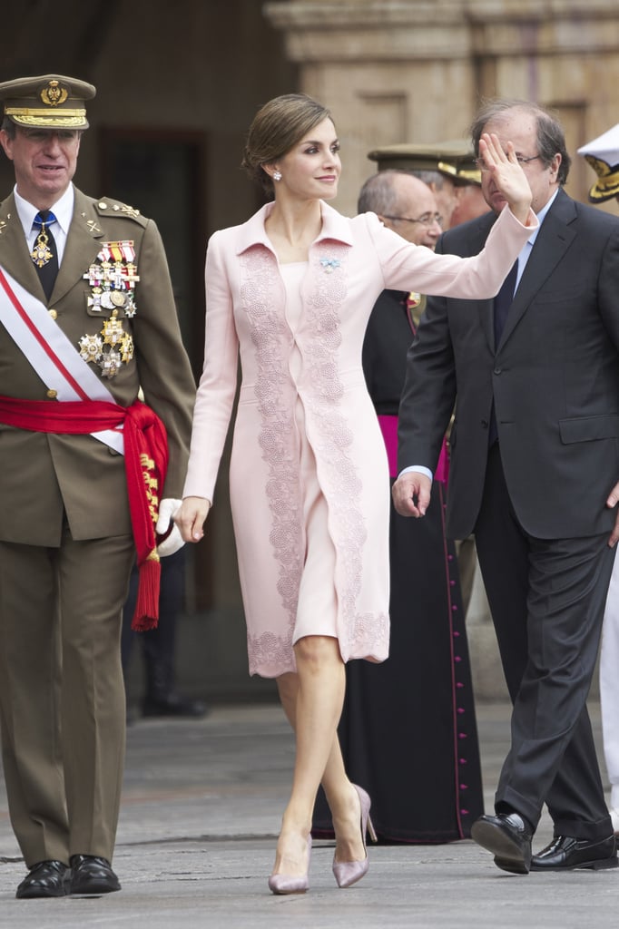 Queen Letizia waves to fans at a military event in Salamanca, Spain.