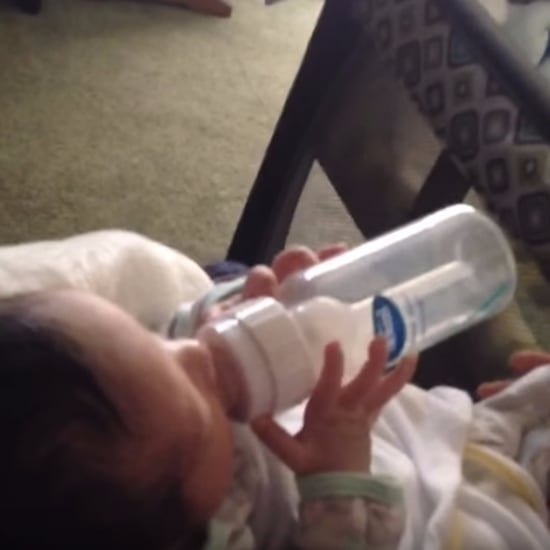 Video of Newborn Holding a Bottle