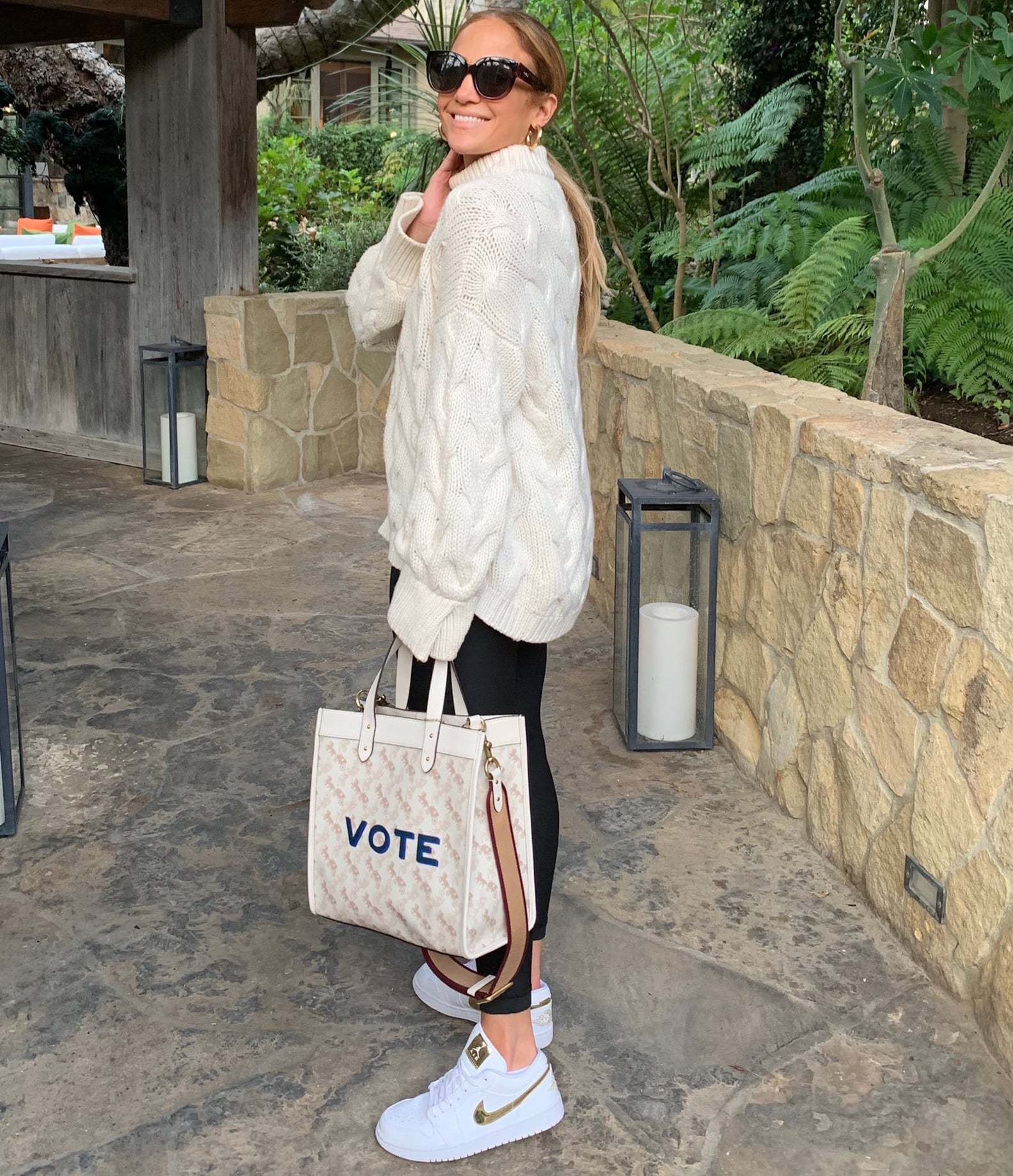 Jennifer Lopez's Monogrammed Coach Bag Says 