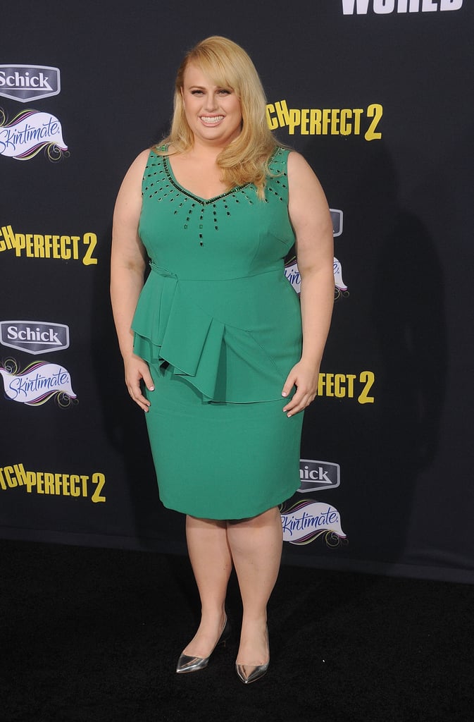 We're hoping to see something similar to this green peplum creation. 'Tis the season, after all.