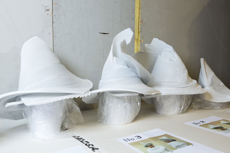 Hats Backstage at the Issey Miyake Show