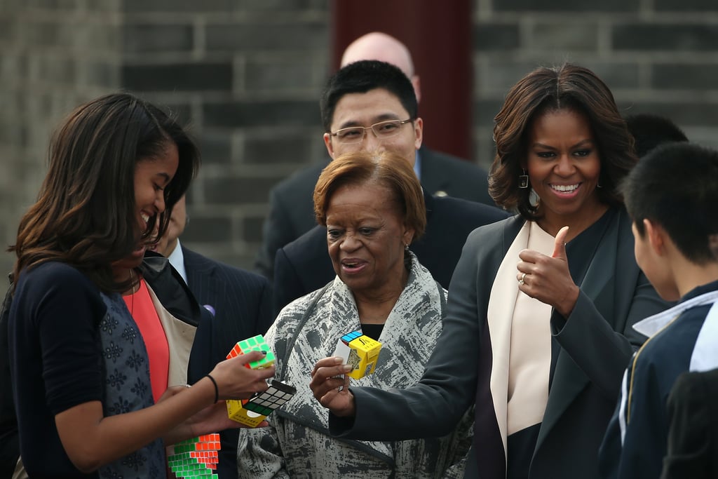Michelle played with a minicube alongside Malia.