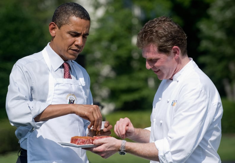 Grilling a steak with Bobby Flay in 2009.