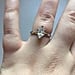 Single Woman Wearing an Engagement Ring While Working