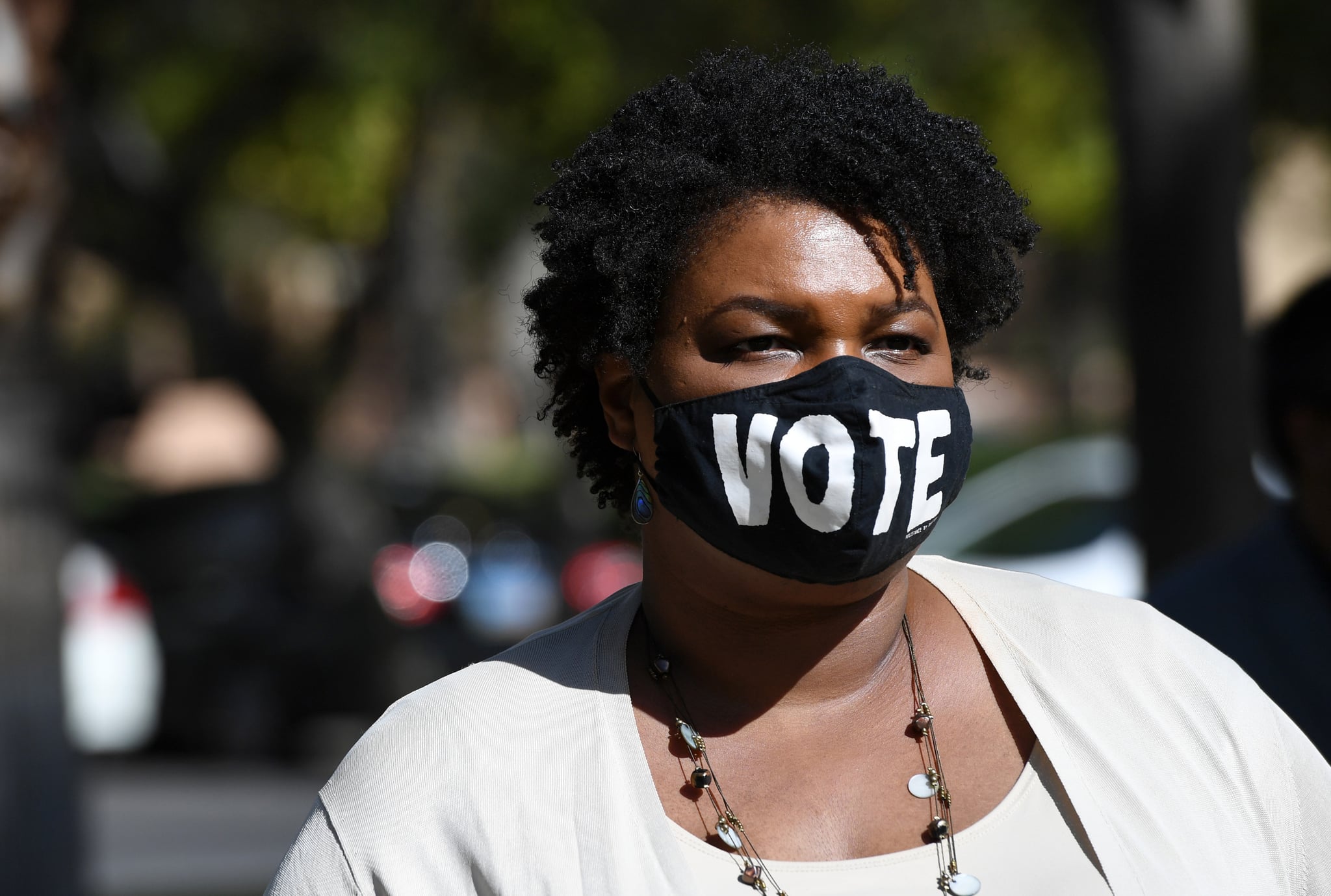 LAS VEGAS, NEVADA - OCTOBER 24:  Former Georgia gubernatorial candidate Stacey Abrams waits to speak at a Democratic canvass kickoff as she campaigns for Joe Biden and Kamala Harris at Bruce Trent Park on October 24, 2020 in Las Vegas, Nevada. In-person early voting for the general election in the battleground state began on October 17 and continues through October 30.  (Photo by Ethan Miller/Getty Images)