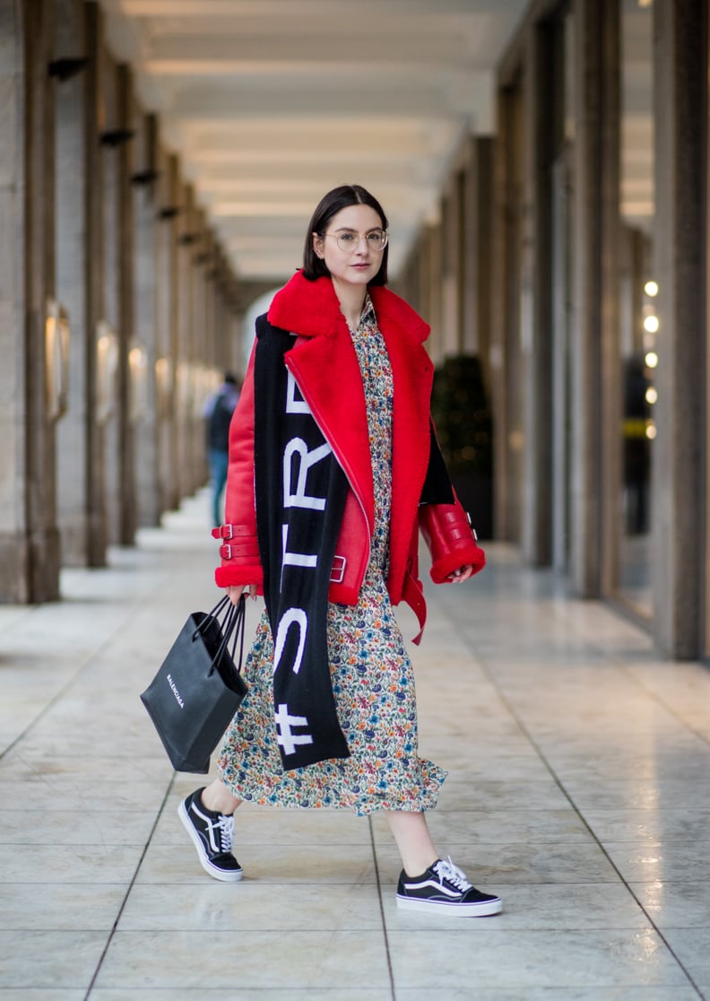 With a Bold Shearling Leather Jacket, Floral Dress, and Logo Scarf