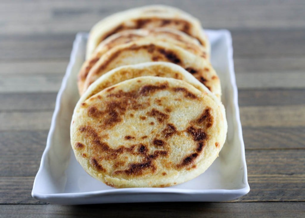 When the idea of a cold sandwich makes you want to jump under the covers and protect yourself from the cold, try arepas, corn pockets stuffed with various savory fillings like shredded beef, black beans, and cheese.
