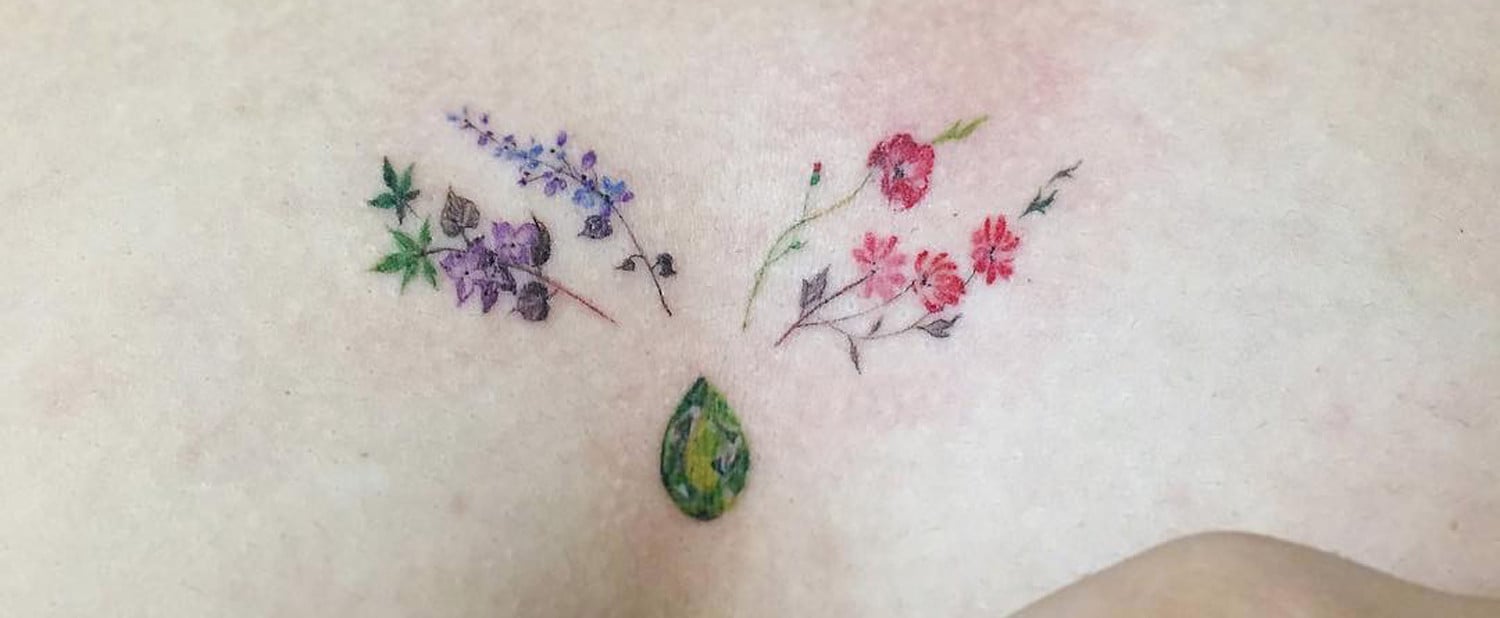 Arrow tattoo with December Narcissus flower and December birthstone color  on back forearm  Lower back tattoos Back tattoos Back tattoo women