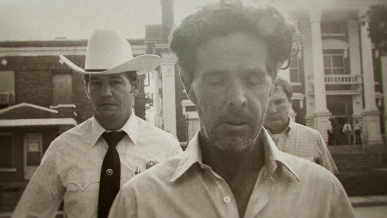 The Confession Killer — Henry Lee Lucas (center) walking in front of Ranger Phil Ryan (left)