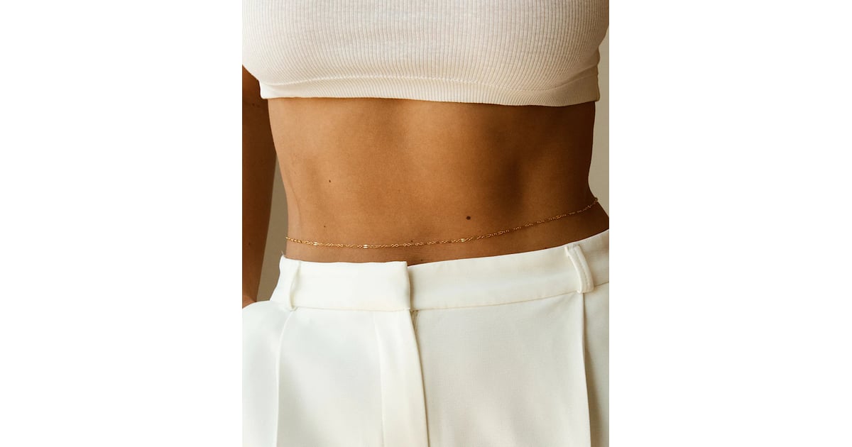 Shop Vanessa Hudgens's Belly Chain | Vanessa Hudgens's Black Turtleneck