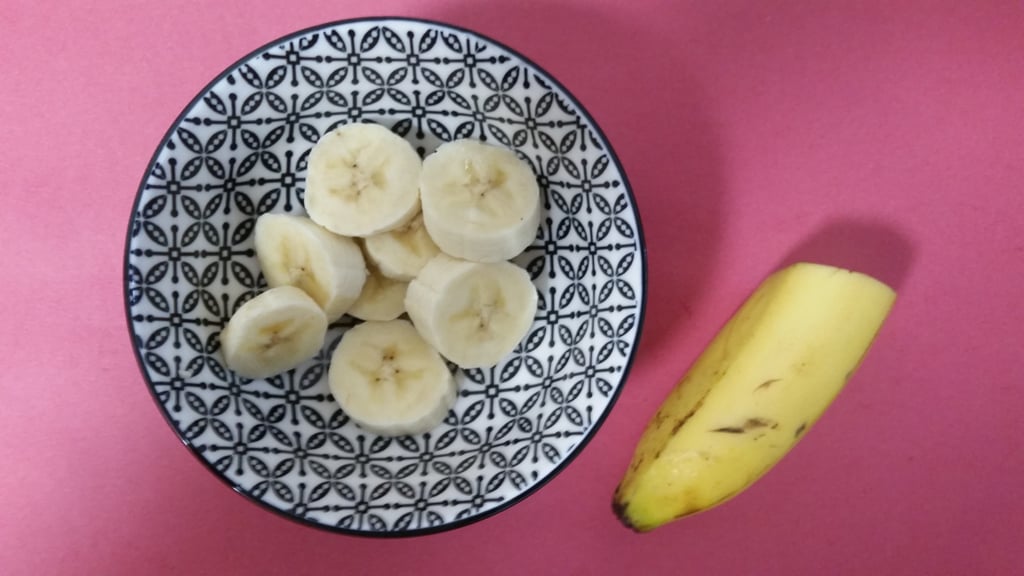 How to Use It: Use the inside of a perfectly ripe banana peel to gently rub the affected area for about 10 minutes, and then rinse with lukewarm water before cleansing. This is one of the most soothing ways to bring down the size of a pimple, and also one of the most nourishing because it leaves the area hydrated instead of drying it out. Apply twice a day (and don't forget to eat the banana!).