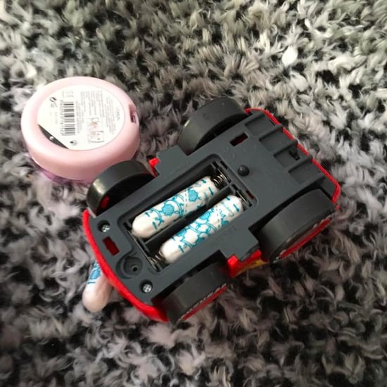 Boy Puts Tampons in Battery Compartment of Toy Car
