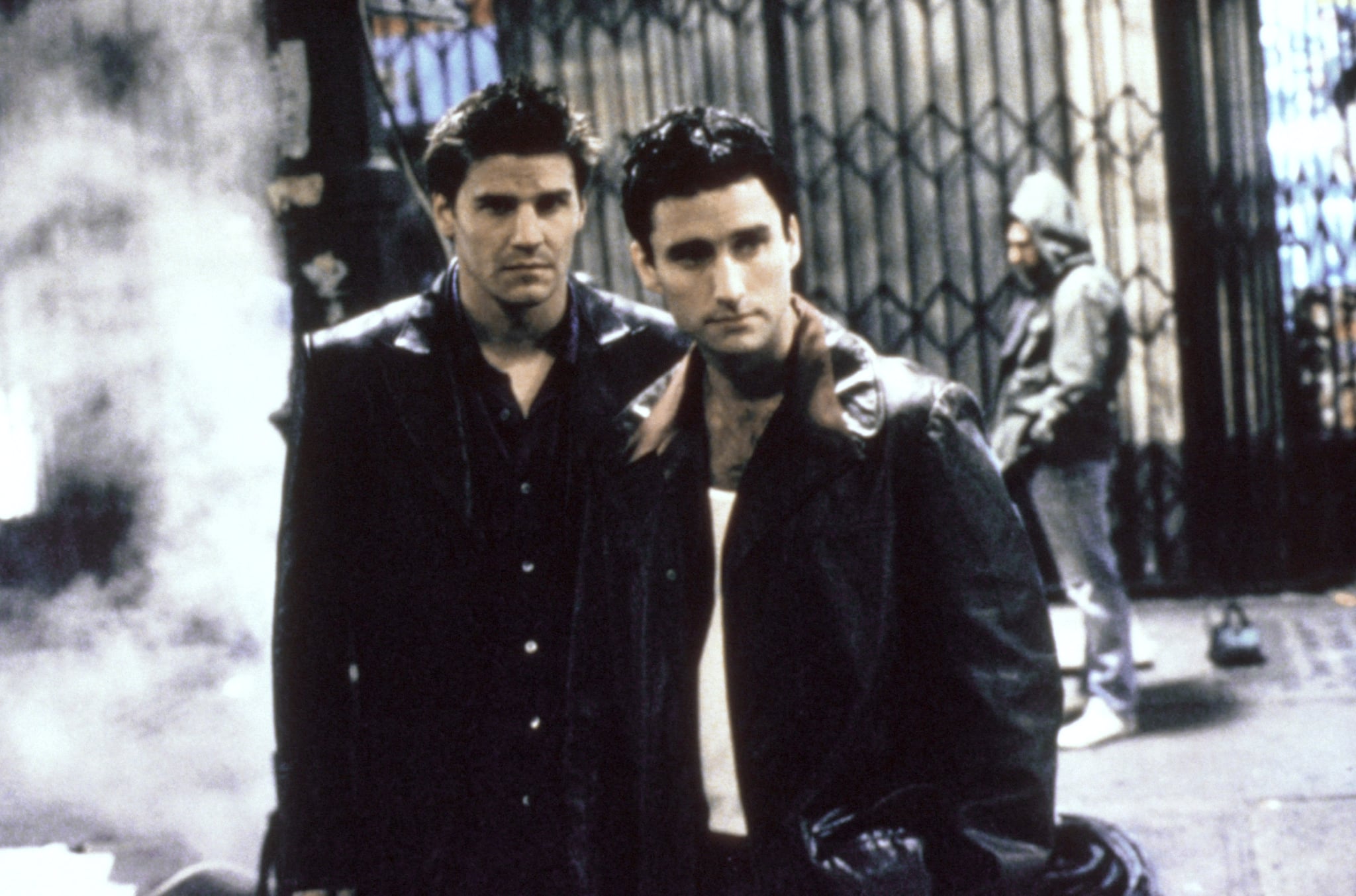 ANGEL, (from left): David Boreanaz, Glenn Quinn, 'City of...', (Season 1, aired Oct. 5, 1999), 1999-2004, TM and Copyright 20th Century Fox Film Corp. All rights reserved./courtesy Everett Collection