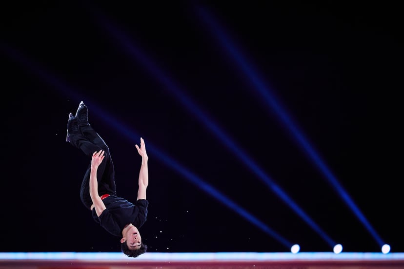 Nathan Chen performs a backflip in the Gala Exhibition of the 2021 ISU World Figure Skating Championships