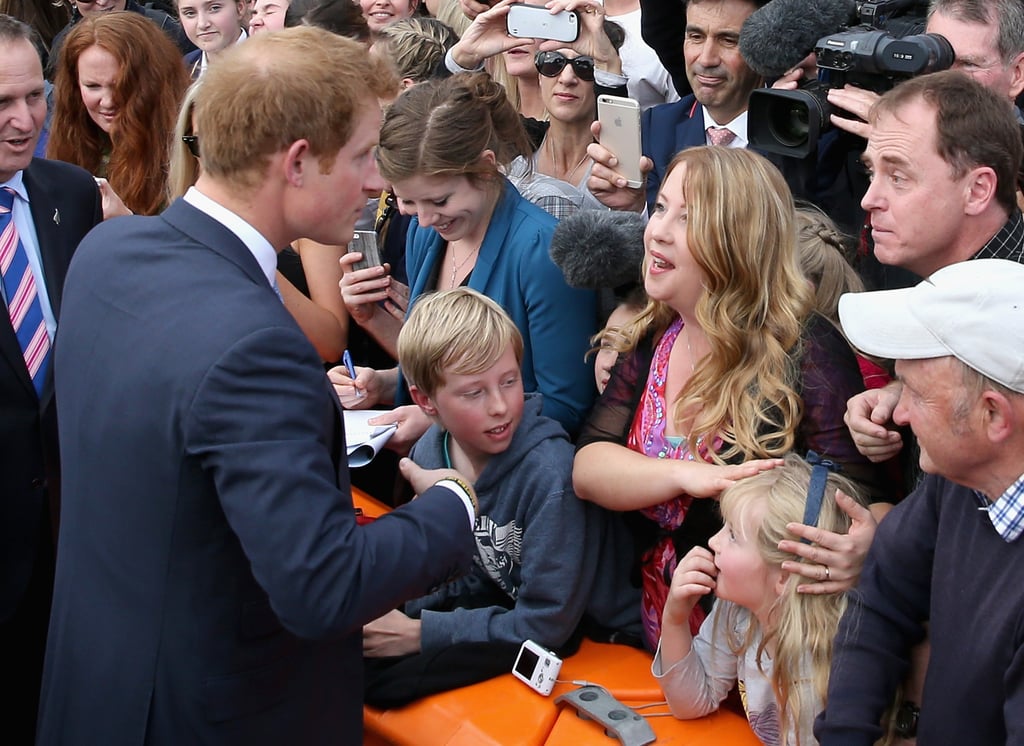 Prince Harry Embraces Former Teacher in New Zealand