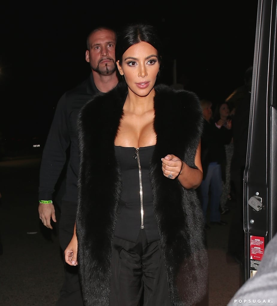 Kim Kardashian's cleavage was front and center when she joined a fun group at Sam Smith's concert in LA on Thursday.