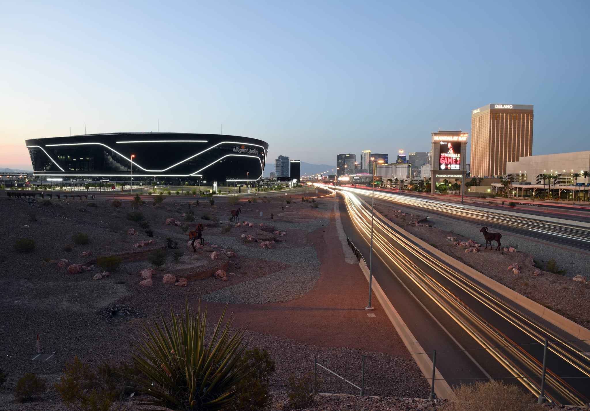 LAS VEGAS, NEVADA - SEPTEMBER 19:  An exterior view shows Allegiant Stadium, the USD 2 billion, 65,000-seat home of the Las Vegas Raiders, west of the Las Vegas Strip on September 19, 2020 in Las Vegas, Nevada. The Raiders will play their first game as Las Vegas' NFL franchise at the glass-domed facility against the New Orleans Saints on September 21, coinciding with the 50th anniversary of the league's first 