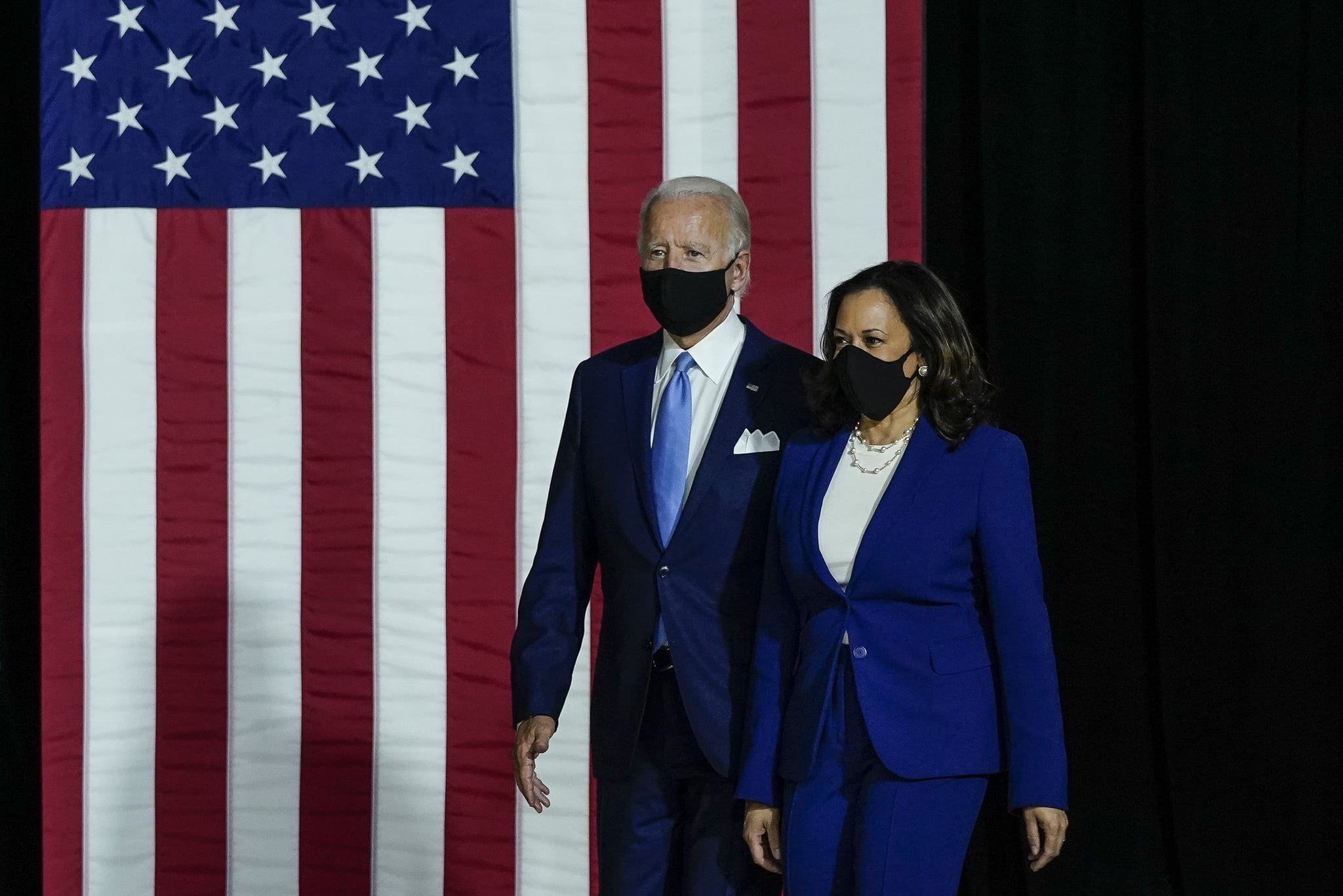 WILMINGTON, DE - AUGUST 12: Presumptive Democratic presidential nominee former Vice President Joe Biden and his running mate Sen. Kamala Harris (D-CA) arrive to deliver remarks at the Alexis Dupont High School on August 12, 2020 in Wilmington, Delaware. Harris is the first Black woman and first person of Indian descent to be a presumptive nominee on a presidential ticket by a major party in U.S. history. (Photo by Drew Angerer/Getty Images)