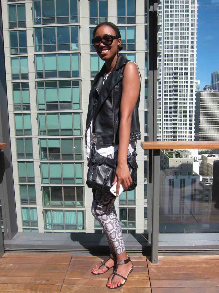 Taneisha channeled a cool-girl biker chic at the MAC Lollapalooza party. Along with a Forever 21 sleeveless moto vest and snakeskin leggings, she kept things cool with a Vince Camuto bag and Prabal Gurung for Target sandals.