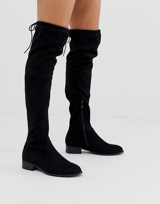 tight over the knee black boots