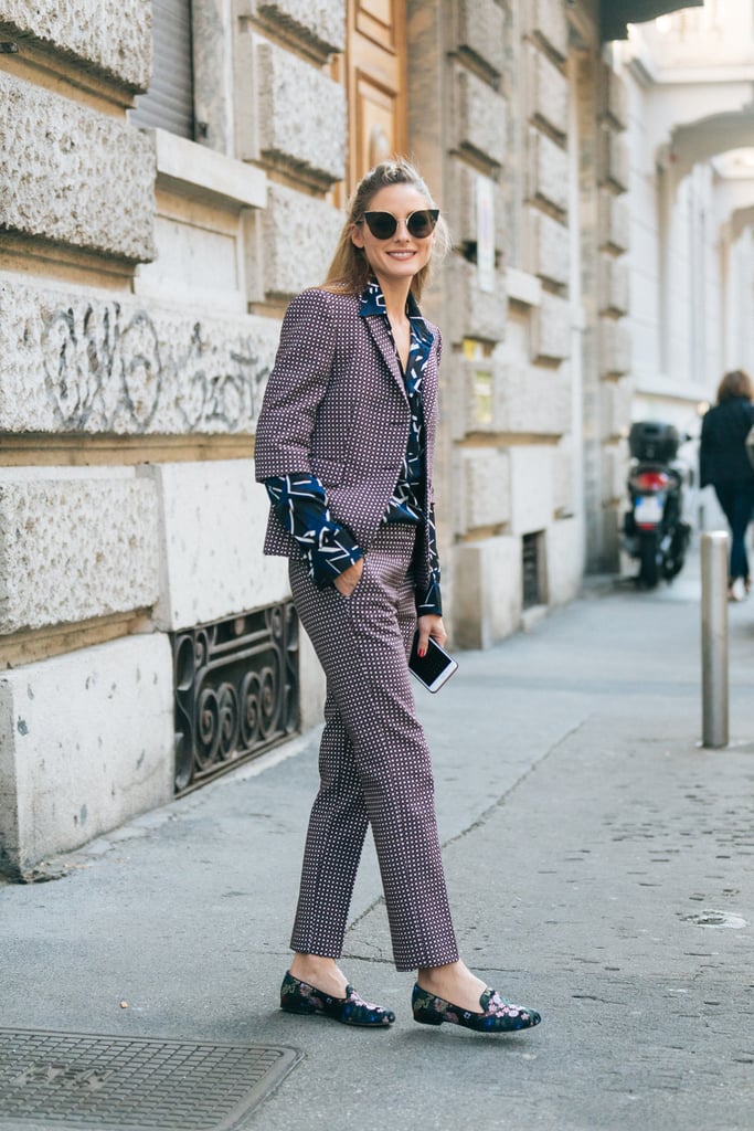 Hack: Give your printed suit set '60s appeal by layering it over a geometric top. Jacquard loafers in the same shade balance out everything.