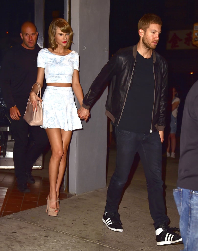 Taylor Swift Wearing Aqua Top and Skirt With Calvin Harris