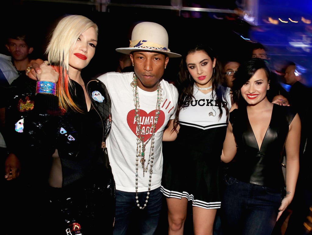 Gwen Stefani, Pharrell Williams, Charli XCX, and Demi Lovato got together at KIIS FM's Jingle Ball concert in LA on Friday.
