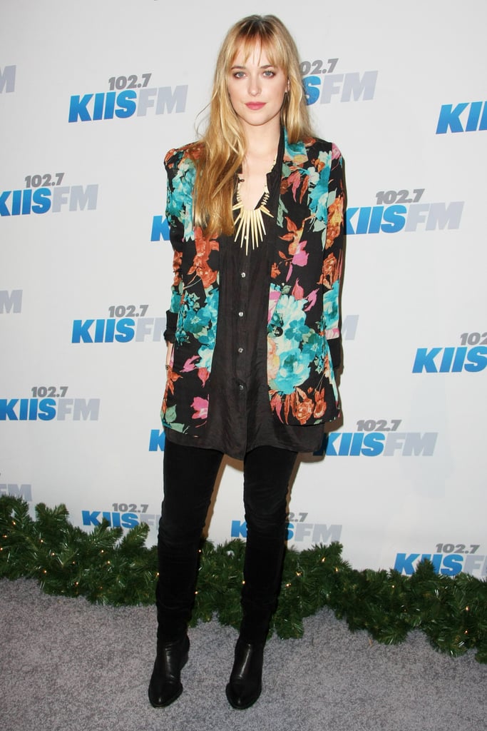 Wearing an oversize floral blazer at Jingle Ball.