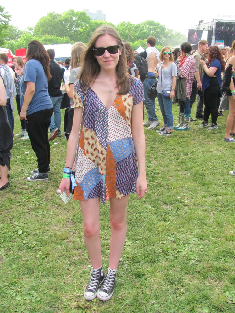 This festivalgoer kept her look comfy and chic in a patchwork Zara playsuit, Converse, and sunglasses.