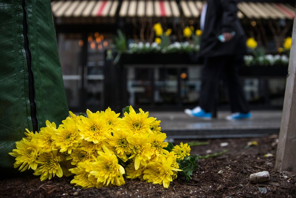 Flowers were set along the finish line of the Boston Marathon on the