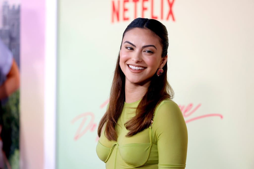 Camila Mendes Wears Green Versace Corset Top, Low-Rise Skirt