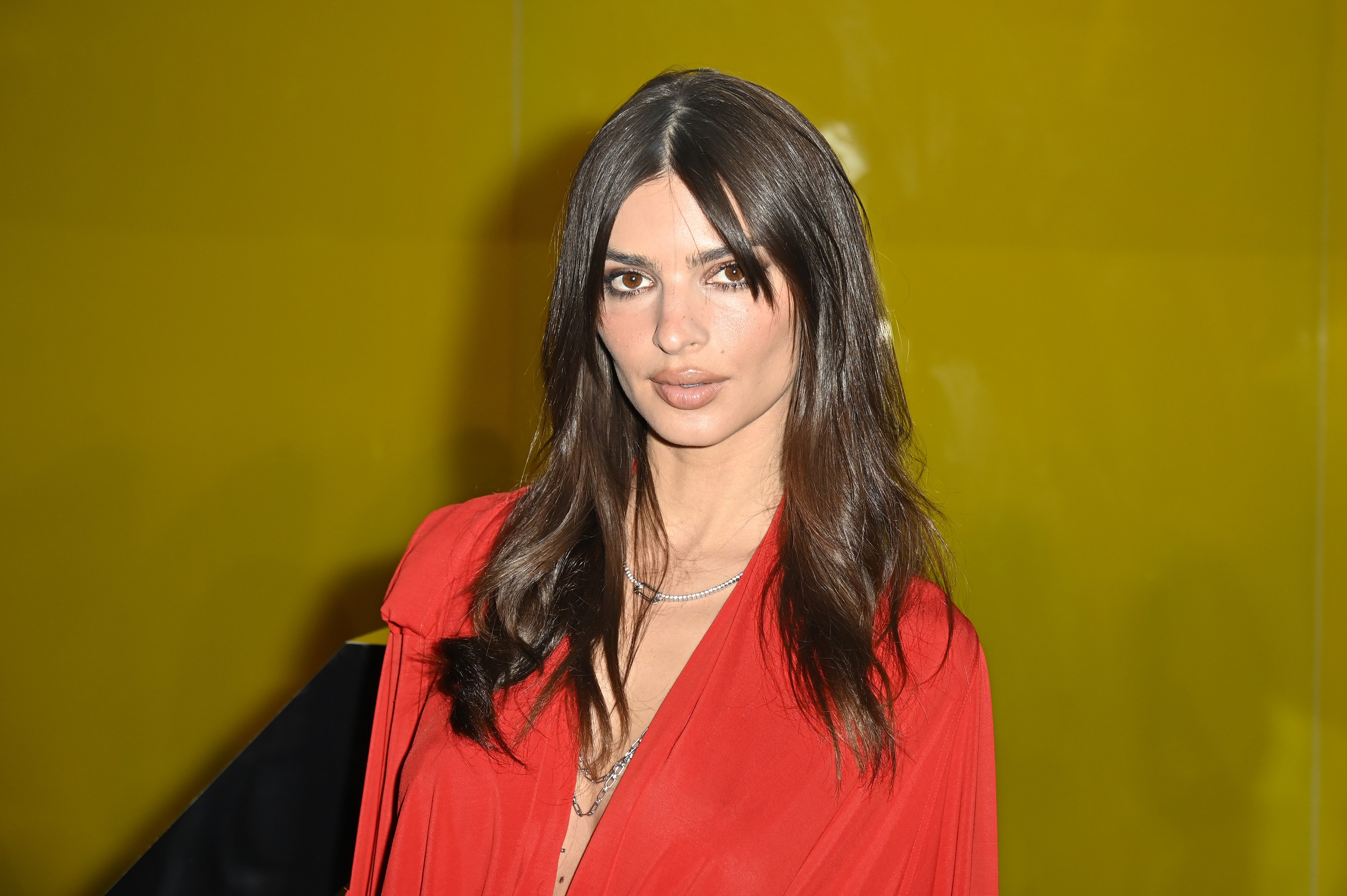 Emily Ratajkowski Wears Retro Sneakers With Socks Over Pants