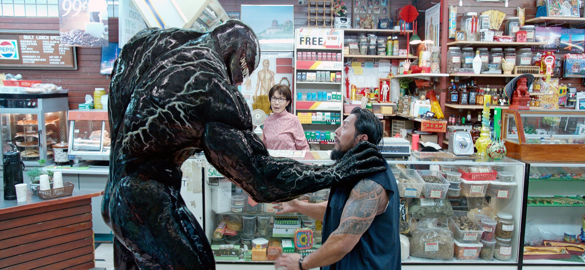 VENOM, left: Tom Hardy as Venom, 2018.  Columbia Pictures/courtesy Everett Collection