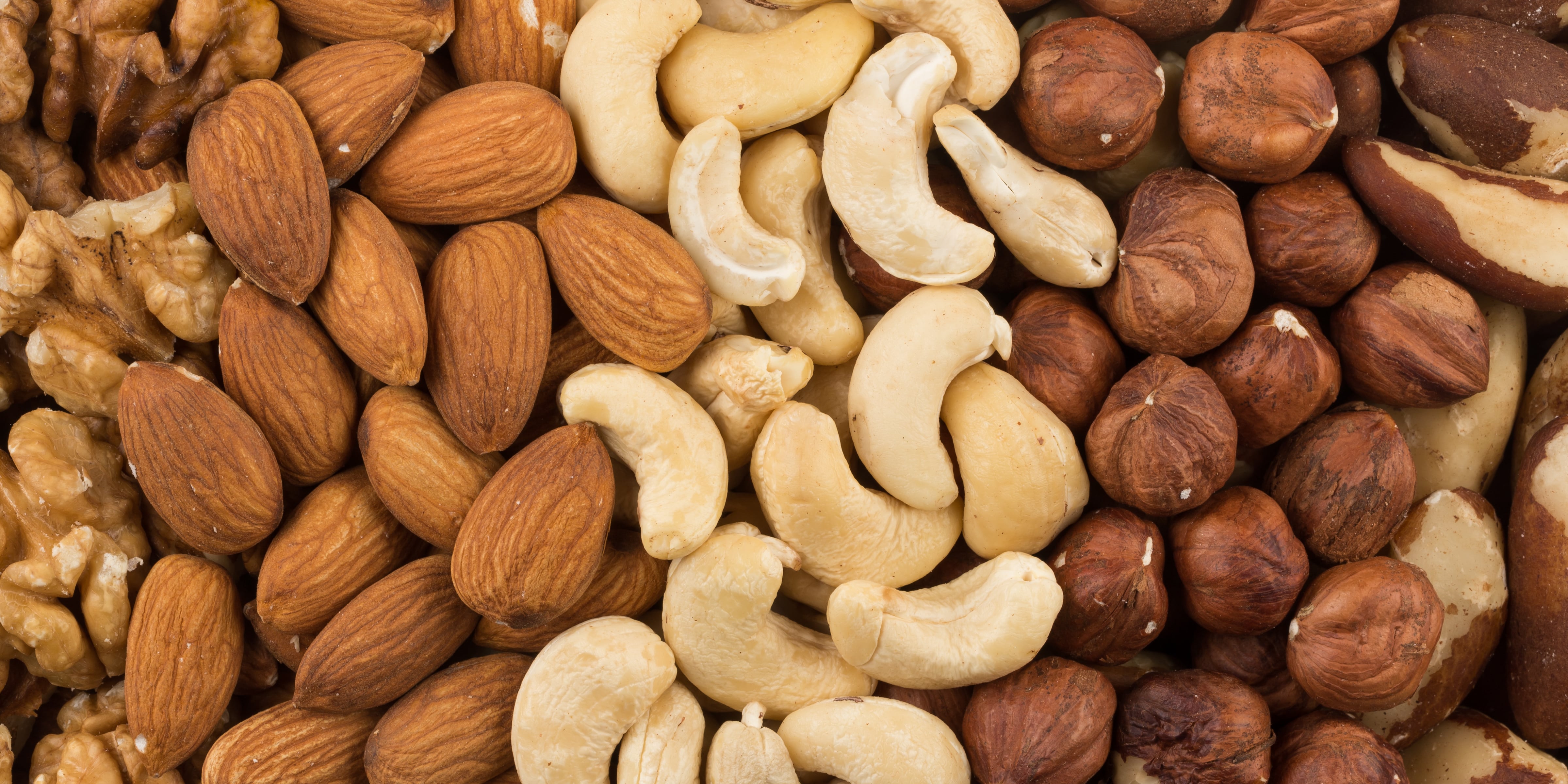 close-up assortment of almonds, cashews, hazelnuts, and walnuts