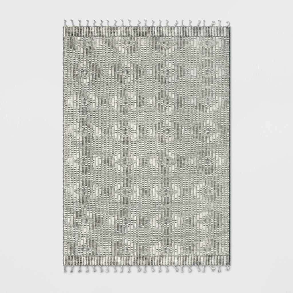 一个图案地毯:门槛设计与工作室麦基钻石户外地毯流苏
